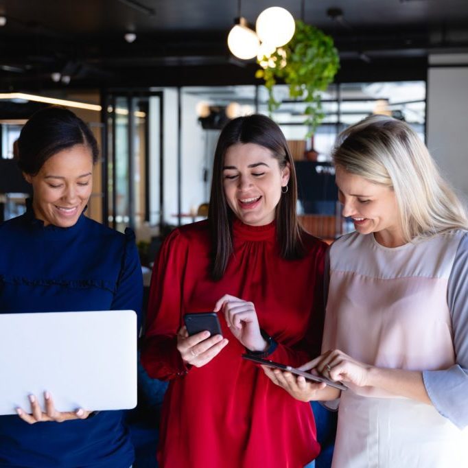 Business women using digital technology